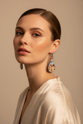 Woman wearing Donji Miholjac castle earrings